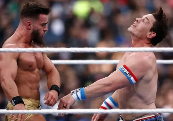 Austin Theory battles John Cena at Wrestlemania 39